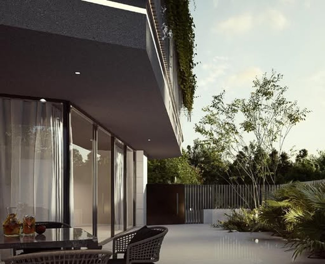 Ground floor terrace with outdoor seating and planting at Jabal Amman 4, Amman